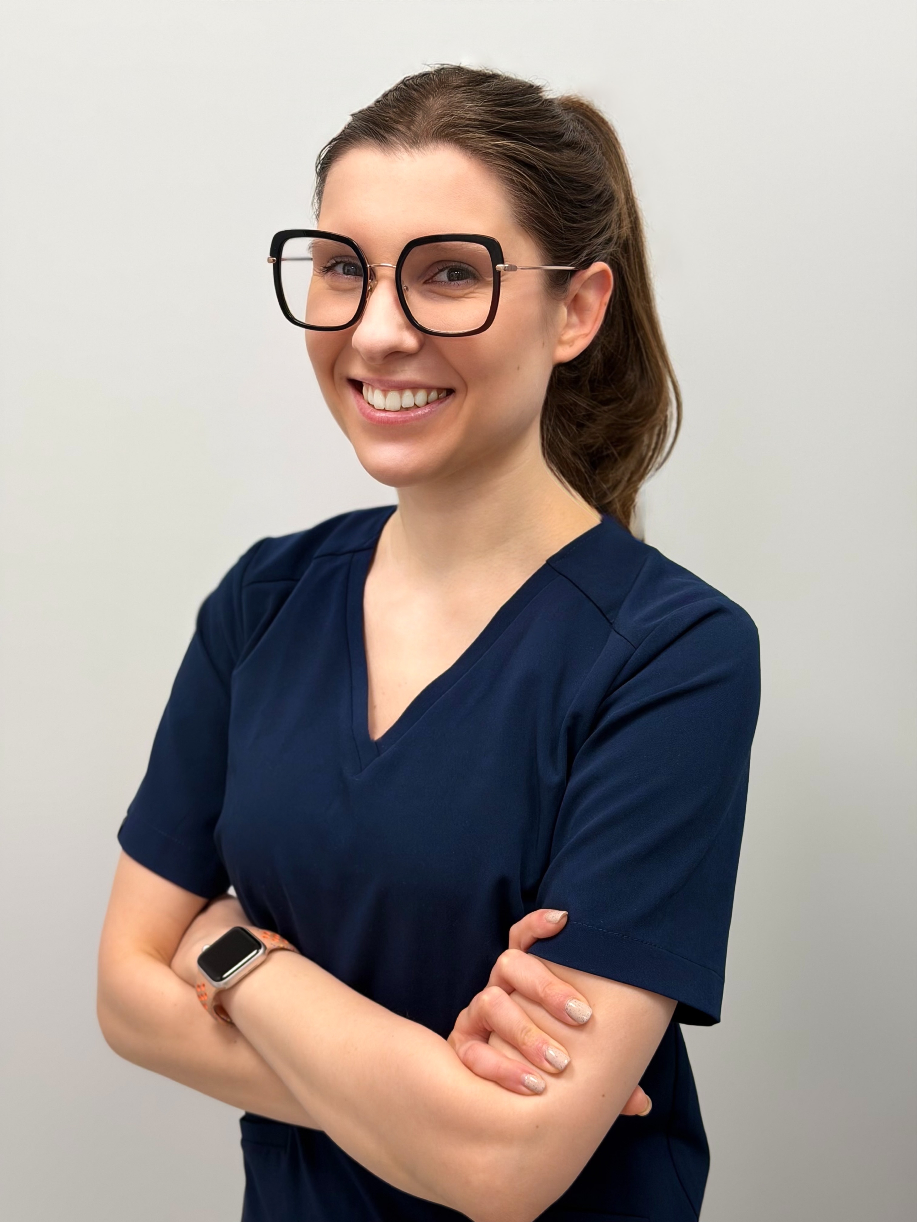 MultiMedica Stargard clinician in clinic scrubs